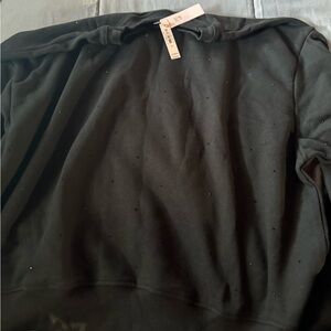 L/G new black sweater with tags.